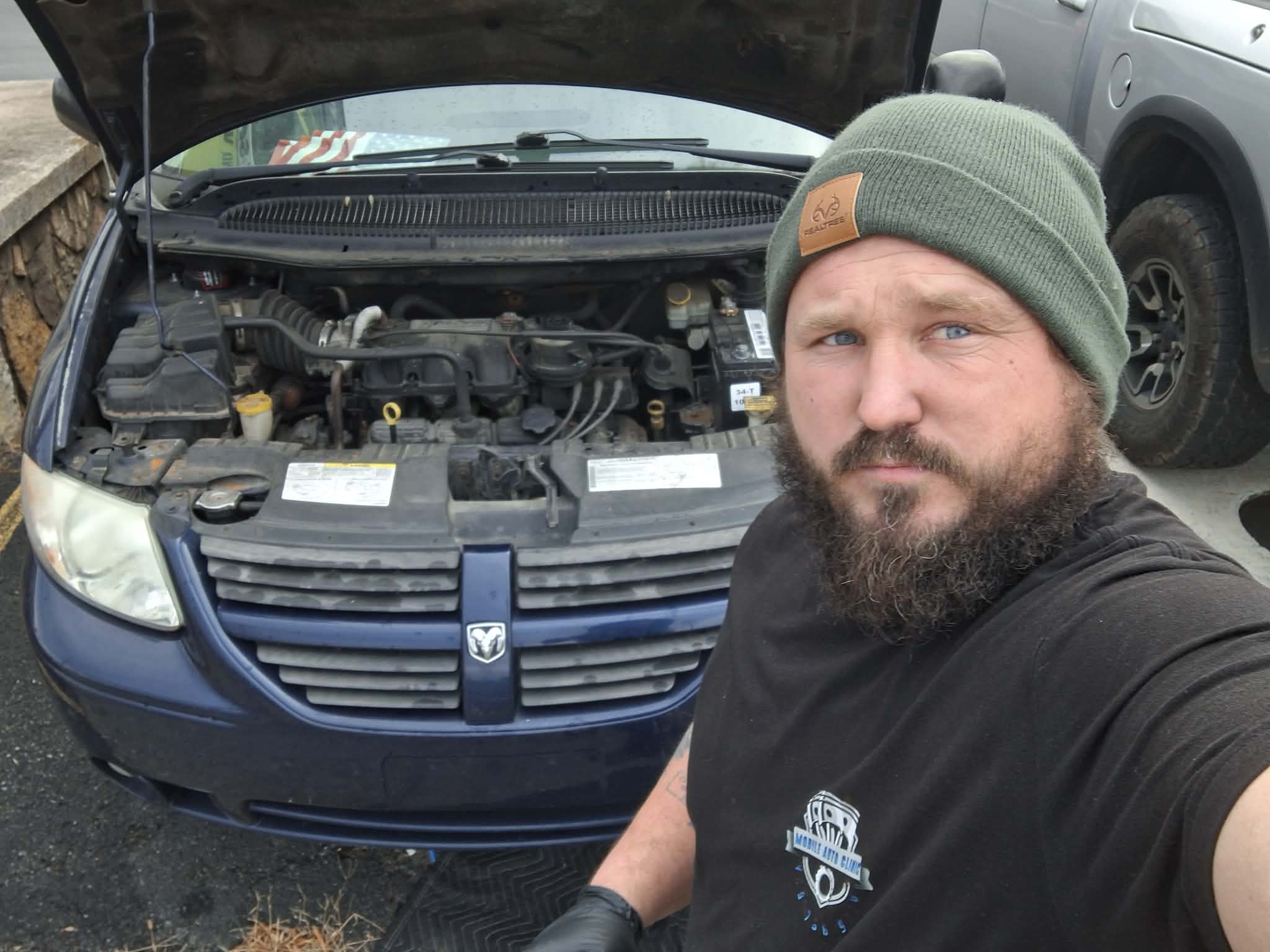 Mobile Auto Clinic mechanic on the job